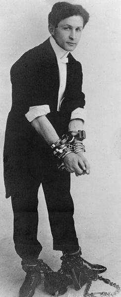 Harry Houdini in handcuffs